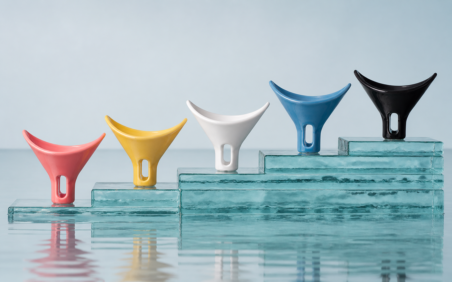 Five VYDRIPPER brewers in coral, yellow, pearl, blue and black glazes